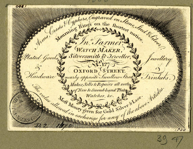 Alte Visitenkarte mit kreisförmigem Design und Text, der wahrscheinlich den Inhalt beschreibt.