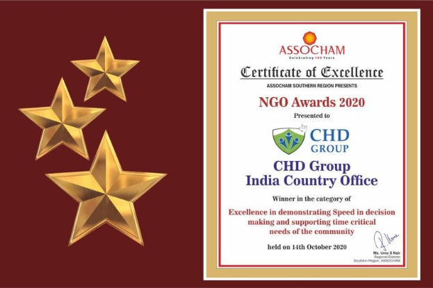 Auszeichnung für excellence für den NGO-Award 2020 an die CHD Group India Country Office überreicht, mit einem Schild-Logo mit einem zentralen Stern und einem Lorbeerkranz.
