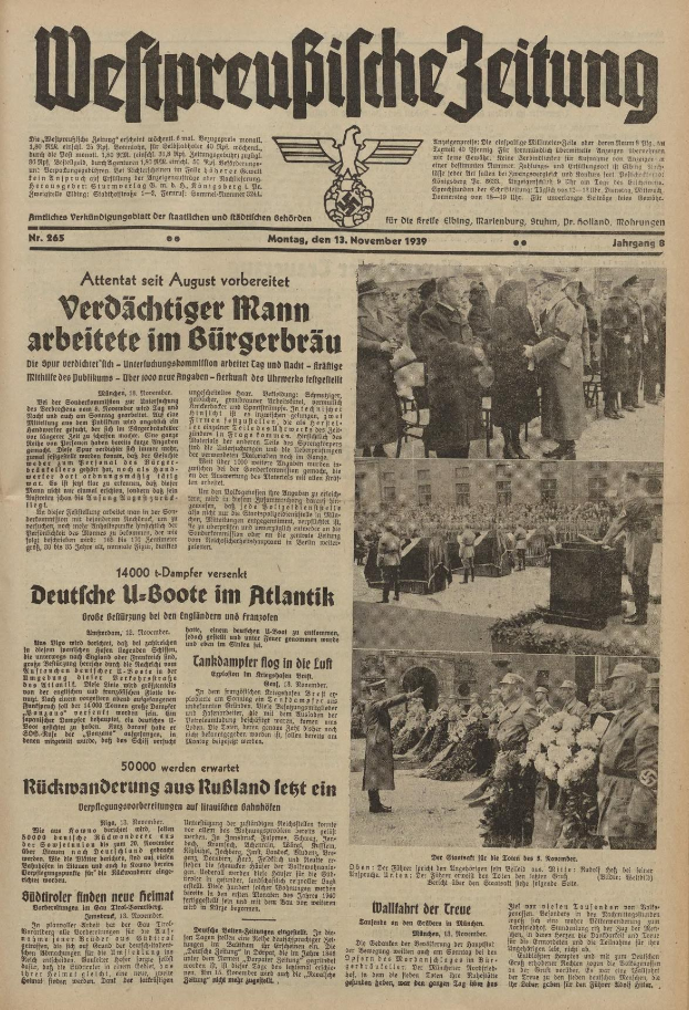 Schwarze-weiß-Titelseite einer deutschen Zeitung vom 13. November 1939 mit der Überschrift 'Weitpreubliche Zeitung', die eine Gruppe von Menschen in traditioneller deutscher Kleidung in einer feierlichen Umgebung zeigt.