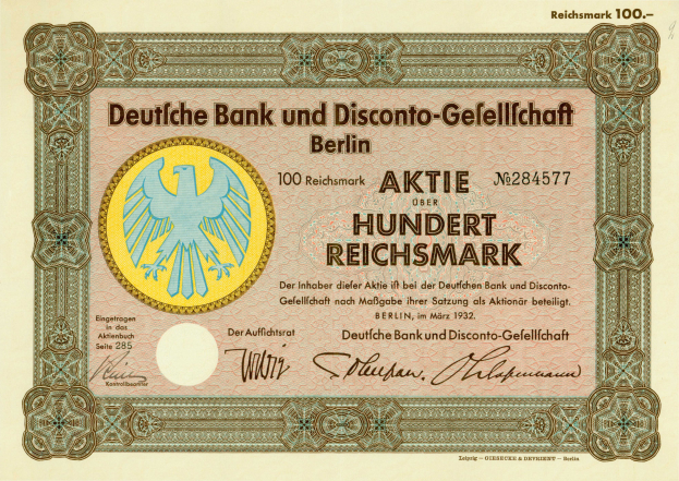 Eine alte deutsche Banknote mit einer Vogeldarstellung und der Aufschrift "Deutsche Bank und Disconto-Gesellschaff Berlin."