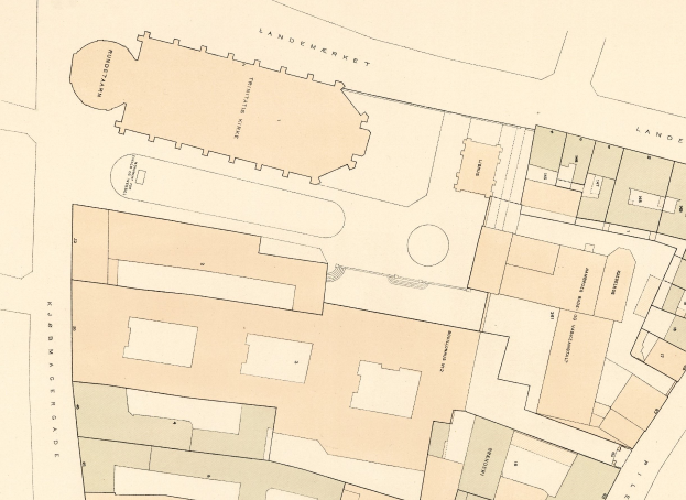 Ausführliche alte Stadtkarte mit zahlreichen Gebäuden, Straßen und beschrifteten Merkmalen.